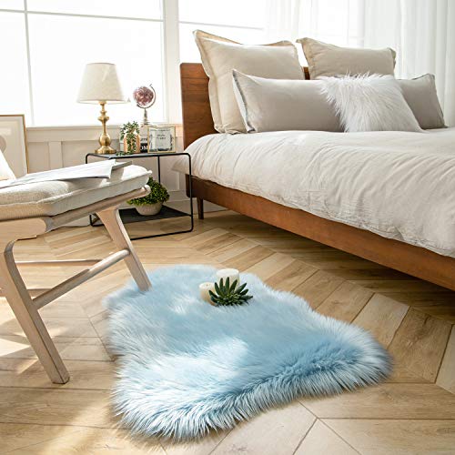Ashler faux fur rug (3' x 2' (Irregular) / C-light Blue)