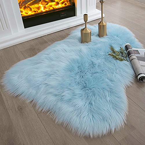 Ashler faux fur rug (3' x 2' (Irregular) / C-light Blue)